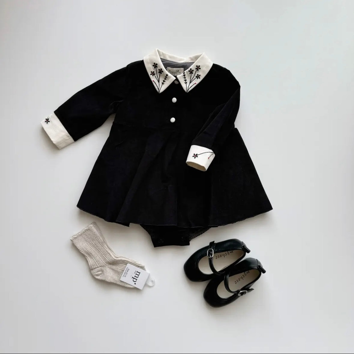 Popelin / Black velvet romper suit with skirt, embroidered collar and placket