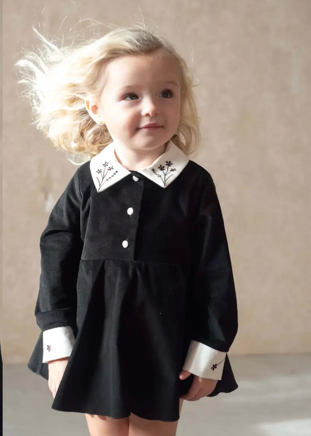 Popelin / Black velvet romper suit with skirt, embroidered collar and placket