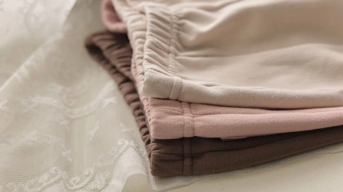 the beige / Front-slit flared pants