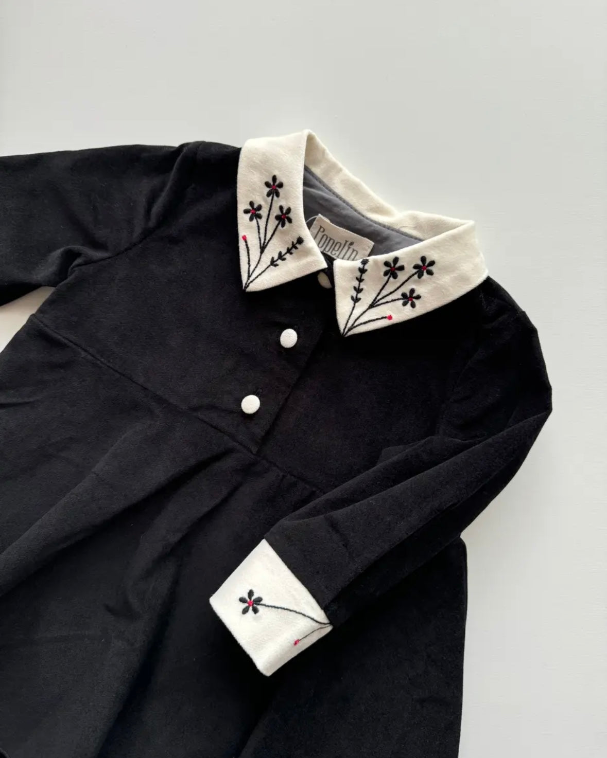 Popelin / Black velvet romper suit with skirt, embroidered collar and placket