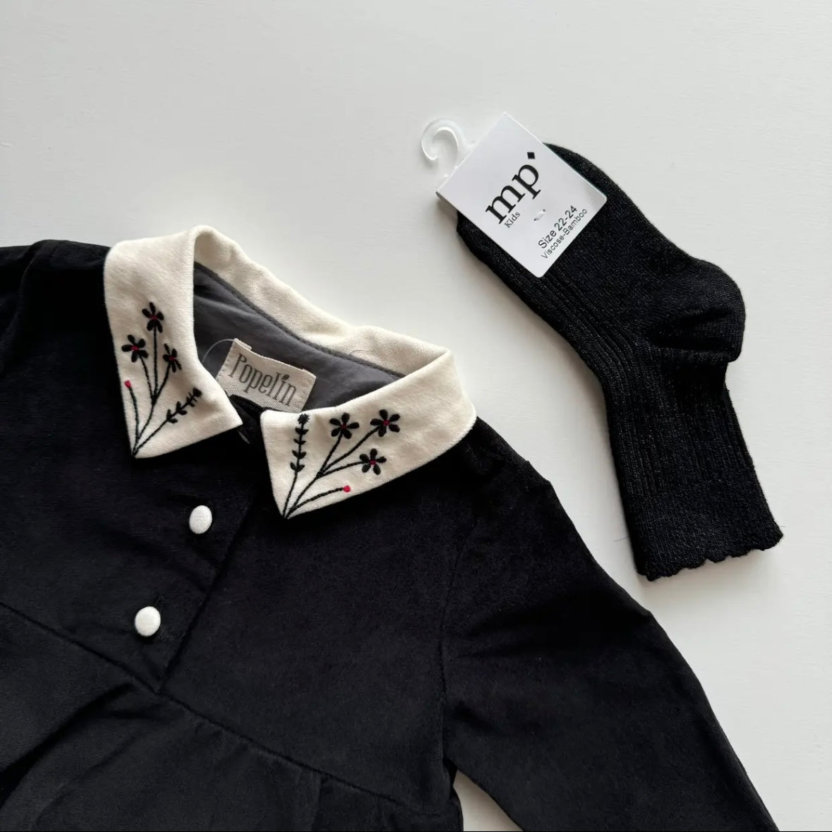 Popelin / Black velvet romper suit with skirt, embroidered collar and placket