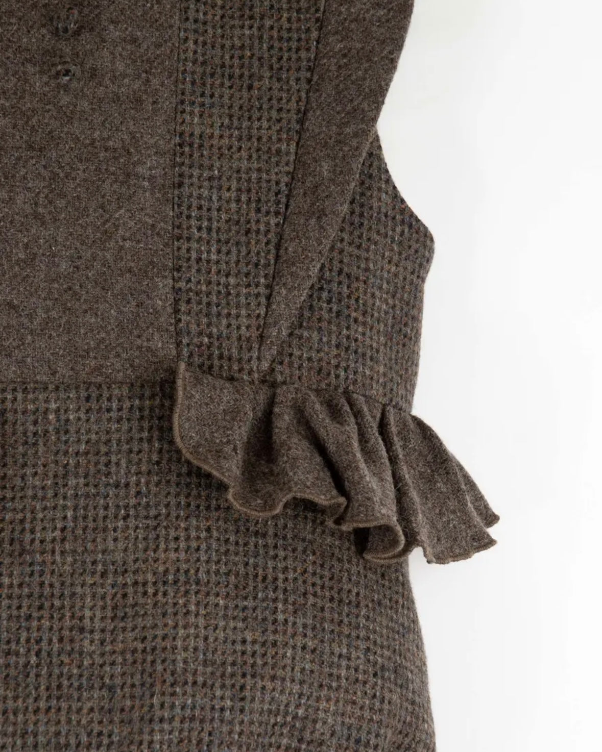 Popelin / Multi-coloured woollen romper suit with frill