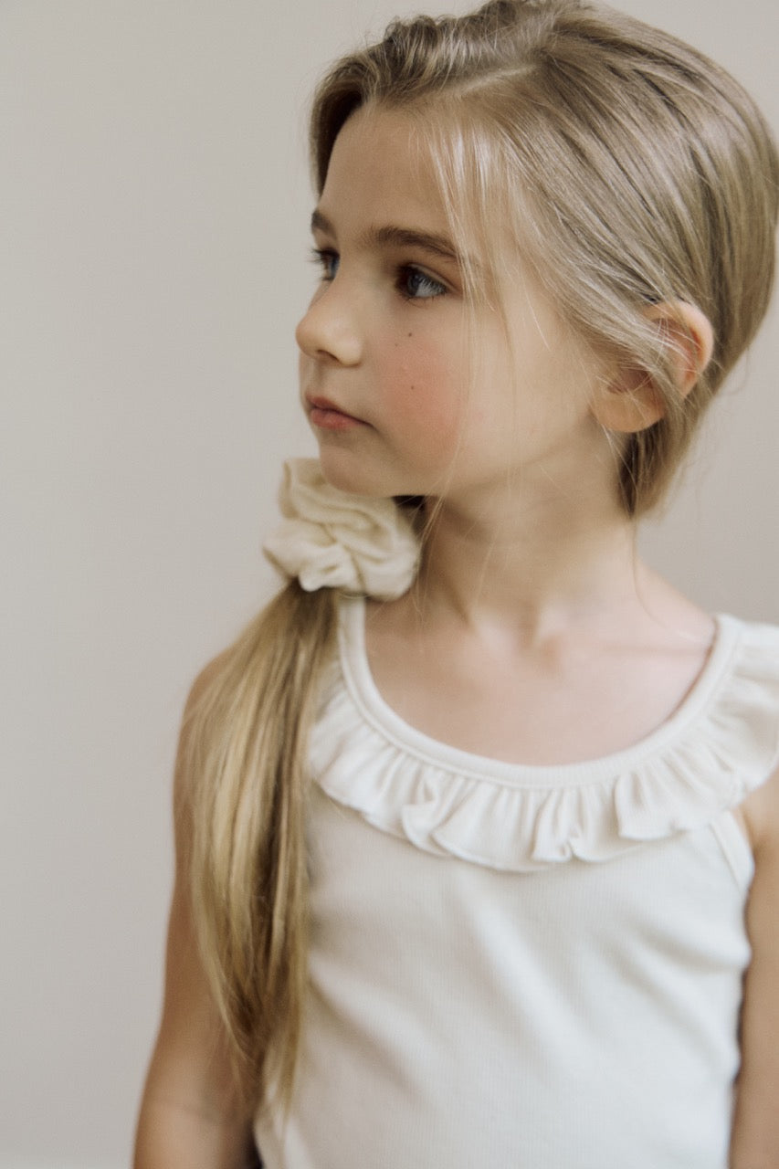 (予約) inné / ruffled sleeveless (born)